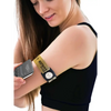 Black fitness tracker with gold band on wrist, part of Dexcom G7 CGM Adjustable Armband